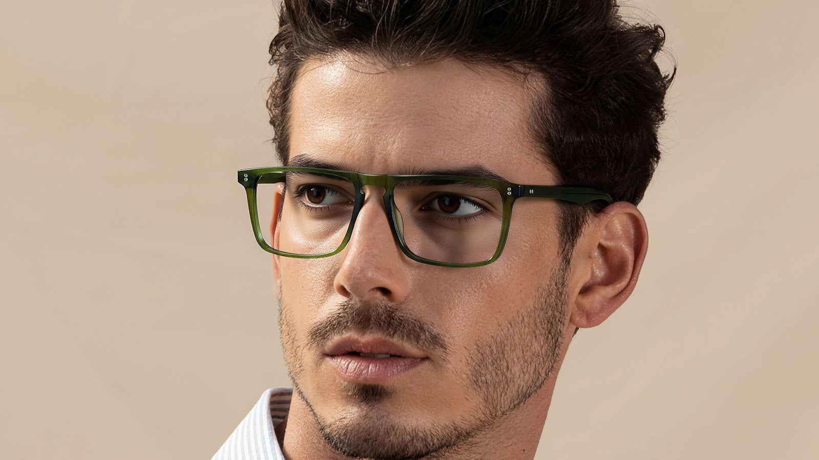 Man wearing green full-rim acetate prescription glasses