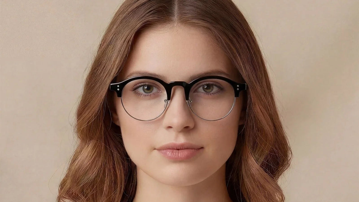 Woman wearing black semi-rimless round eyeglasses