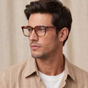 Man wearing tortoiseshell glasses Timeless Tortoiseshell IGIOO Martia Square Eyeglasses 