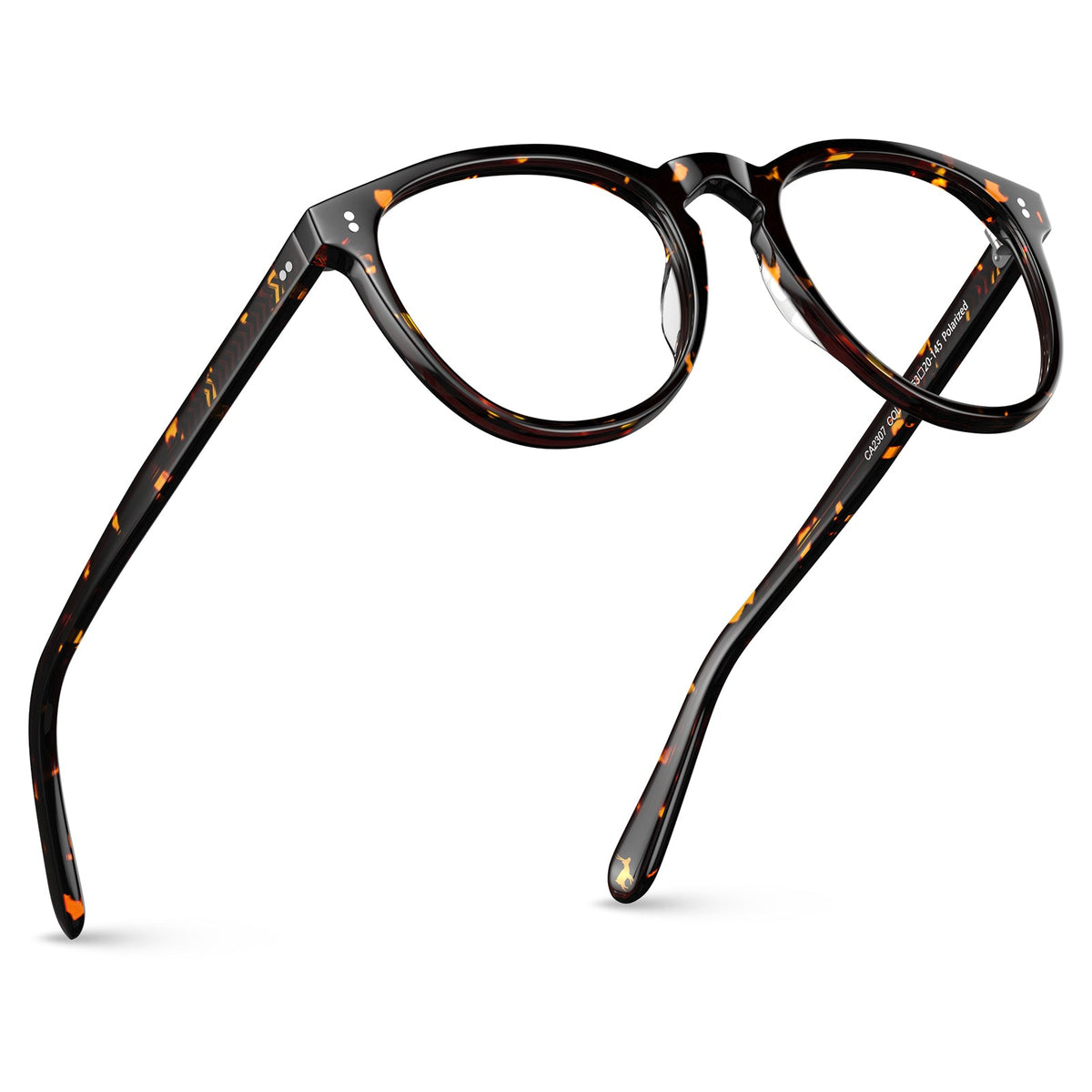 Premium tortoise acetate eyewear detail - handcrafted Italian frame close-up