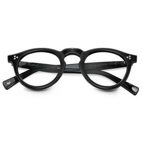 Unisex round eyeglasses Mesa CA2306-FC01 lifestyle worn image vintage style prescription frames with rivet accents flod